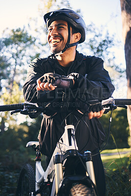 Buy stock photo Forest, fitness and smile, cyclist on bicycle in nature with helmet, exercise adventure trail and healthy mindset. Cycling, relax and man with mountain bike in trees for workout, motivation or energy