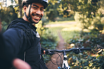 Buy stock photo Selfie, cycling and smile with man in nature for social media, training and workout. Happiness, internet and exercise with portrait of cyclist on bike in forest park for adventure, cardio and picture