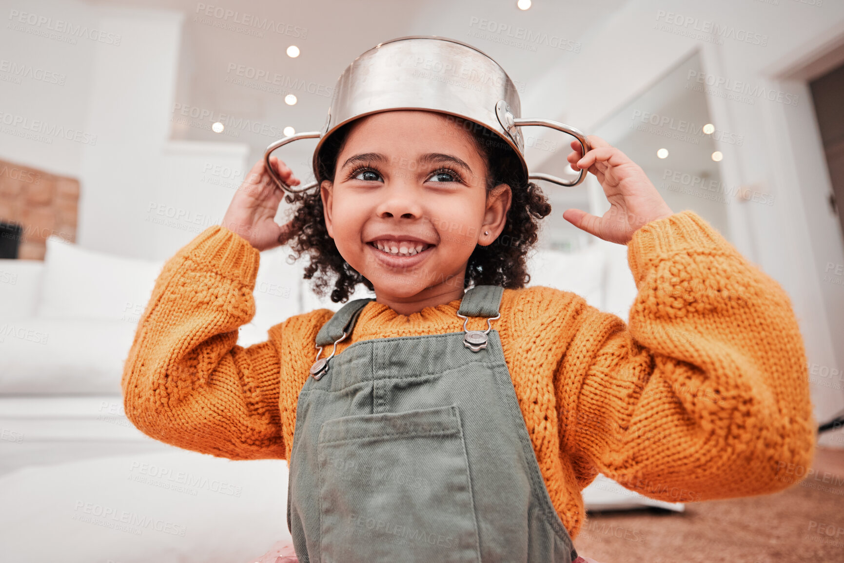 Buy stock photo Children, playing and a girl with a pot on her head in the living room of her home while having fun in a fantasy game. Kids, cute and imagination with an adorable little female child in a house