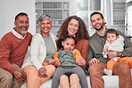 Family, portrait and children happiness in a home with mother, grandparents and baby together. Parent love, smile and dad with elderly people and child in a house living room with support and care