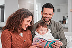 Parents, baby and reading story on sofa with smile, happiness and bonding with love in living room. Man, woman and child with book for learning, care and relax together on lounge couch in family home