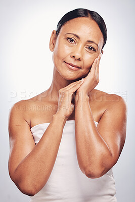 Buy stock photo Portrait, cosmetics and senior woman with skincare, beauty and grooming against a white studio background. Face, mature female and person with salon treatment, wellness and body care for confidence