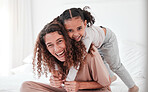 Portrait, mother and girl on bed, piggy back and smile with joy, bonding and quality time. Face, mama carry daughter and happiness in bedroom, loving and fun with female child, kid and mom relax