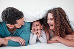 Family, portrait and parents laughing with child, relax with smile under blanket in bed with love and care. Spending time together, bonding and relationship, man and woman with young girl at home