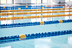 Empty, swimming pool or lines in water for race or racing lanes for fitness or underwater sports. Performance, blue or swim training arena ready for cardio performance, workout or exercise challenge