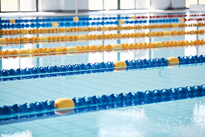 Buy stock photo Empty, swimming pool or lines in water for race or racing lanes for fitness or underwater sports. Background, blue or gym training arena ready for cardio performance, workout or exercise challenge