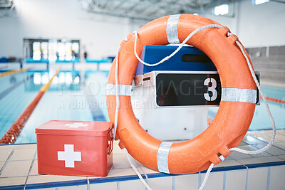 Buy stock photo Swimming, equipment and first aid at a pool for security, safety and emergency. Healthcare, guarding and kit for protection, help and support for water activities, sports competition or recreation