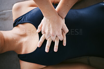 Buy stock photo Hands, cpr and first aid with help of lifeguard for emergency, drown or accident after swimming. Sports, breathing and resuscitation of woman, rescue of athlete or saving life of swimmer in top view.