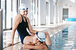 Sports, women or friends in swimming pool on break in training, workout and exercise for wellness. Athlete swimmers, smile or happy girls speaking or bonding in fitness or healthy lifestyle together