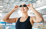 Professional swimming, happy woman with goggles at pool for training and exercise, wellness and winner mindset. Water sport, workout and champion asian swimmer at competition with smile and happiness