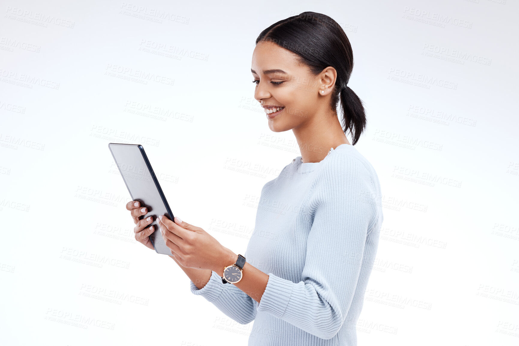 Buy stock photo Woman, tablet and reading in studio by white background for planning, schedule and smile for website. Girl, student and excited on mobile touchscreen app for research, calendar or social network chat