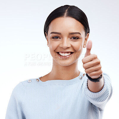 Buy stock photo Portrait, thumbs up and motivation with a woman on a white background in studio for feedback or success. Winner, emoji or hand gesture with an attractive young female saying thank you to show support