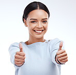 Woman, thumbs up and happy in studio portrait with happiness, confidence or success by white background. Girl, model and student with smile, hand gesture or agreement for winning, goal or achievement