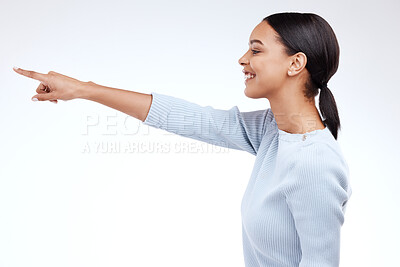 Buy stock photo Studio, profile and happy model pointing at sales promotion, advertising copy space and discount deal mockup. Brand commercial, marketing and product placement gesture for woman on white background