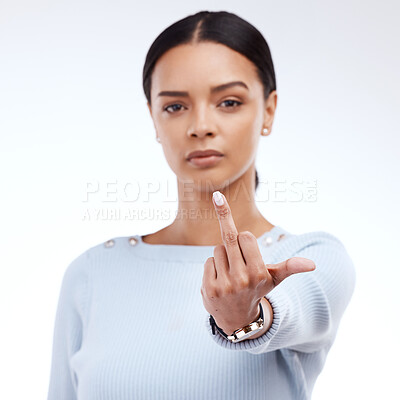 Buy stock photo Woman, studio and middle finger portrait for angry, frustrated and rude emoji. Face of a serious female model with hand gesture for opinion, offended or anger and hate sign on a white background