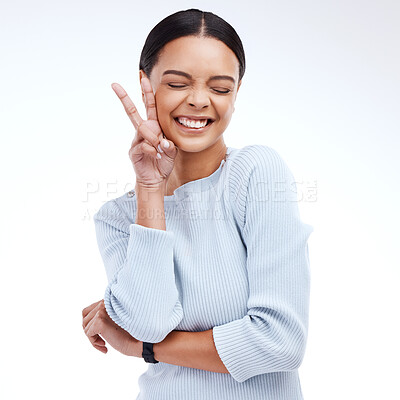 Buy stock photo Peace sign, woman and female hand with emoji gesture in a studio with happiness and excited. V hands, isolated, and white background of a gen z and young model with a happy smile with silly comedy