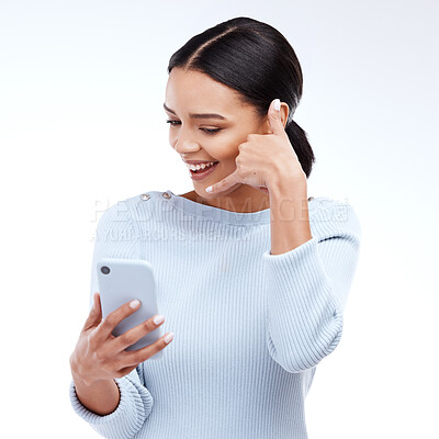 Buy stock photo Phone call, sign and woman isolated on a white background for networking, contact and communication on mobile app. Happy young person talking, hello or conversation on cellphone service in studio