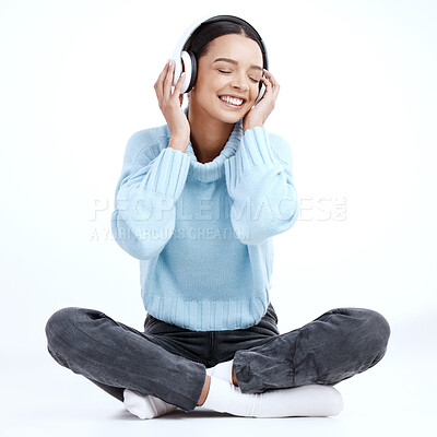Buy stock photo Music headphones, woman and smile in white background, isolated studio and floor. Happy female model listening to sound, streaming album and audio connection of song, podcast subscription and radio 
