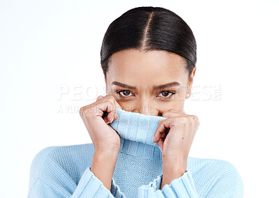 Buy stock photo Shy, woman portrait and studio with a silly, playful and happy young female with winter clothing. Isolated, white background and hiding person face with fashion and warm clothes looking stylish