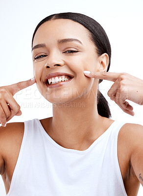 Buy stock photo Happy, beautiful and portrait of a woman for beauty isolated on a white background in a studio. Smile, skincare and face of a young model looking confident about clear complexion and smooth skin