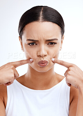 Buy stock photo Frown, portrait and woman in studio sad, disappointed and unhappy against white background. Frown, upset and hands on face of girl with negative emotion, confused or doubt while posing isolated 