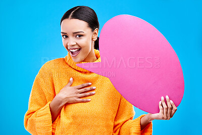 Buy stock photo Speech bubble, wow and portrait of woman with banner in studio for advertising on blue background. Face, omg and female with poster, mockup and space for social media, announcement or billboard news