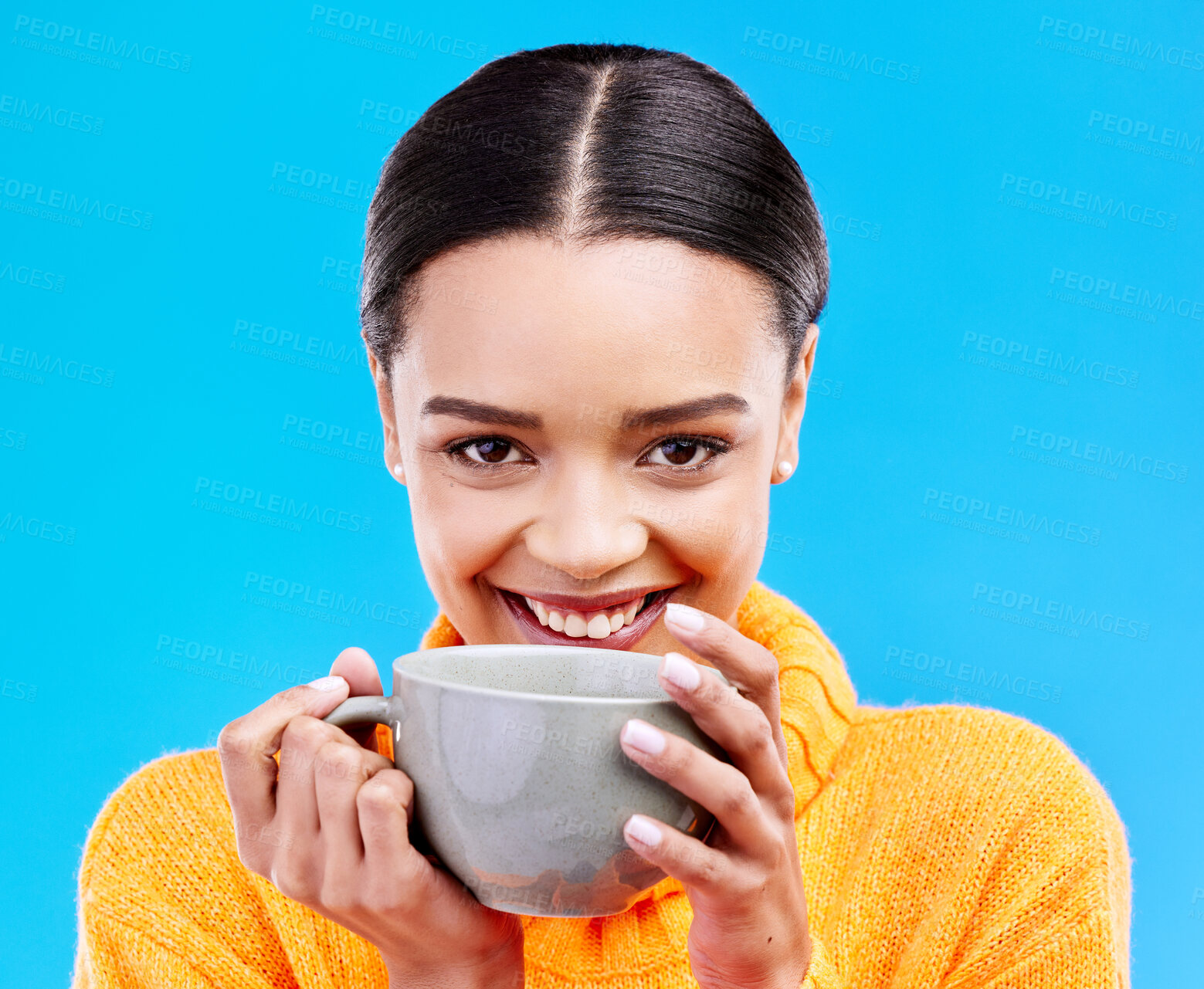 Buy stock photo Coffee, woman portrait and smile in studio with happiness and mug. Isolated, blue background and happy female model or young person with casual winter fashion, latte or tea drink with smiling joy