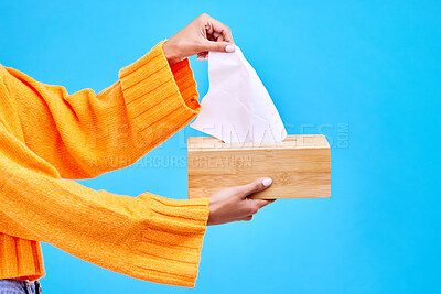 Buy stock photo Box, blue background and hands of woman with tissues for flu, sickness and sinus mockup in studio. Healthcare, toiletries and girl with handkerchief, napkin and paper for cleaning, allergy and sneeze