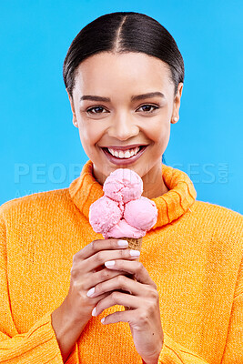 Buy stock photo Happy, ice cream and portrait of woman in studio for summer, snack and sweets. Smile, happiness and sugar with female eating frozen gelato on blue background for dessert, junk food and diet mockup