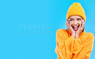 Buy stock photo Happiness, surprised and woman hands on studio mockup ready for cold weather with winter fashion. Isolated, blue background and surprise emoji with a happy, young and gen z person with wow and smile