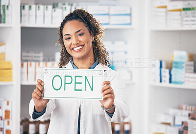 Buy stock photo Open, business sign and woman portrait in a pharmacy with billboard from medical work. Working, pharmacist and healthcare worker with a smile from retail store opening and small business poster