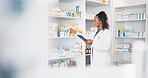 Tablet, stock and medical with a woman in a pharmacy to fill an online order of prescription treatment. Healthcare, product and insurance with a female pharmacist working as a medicine professional