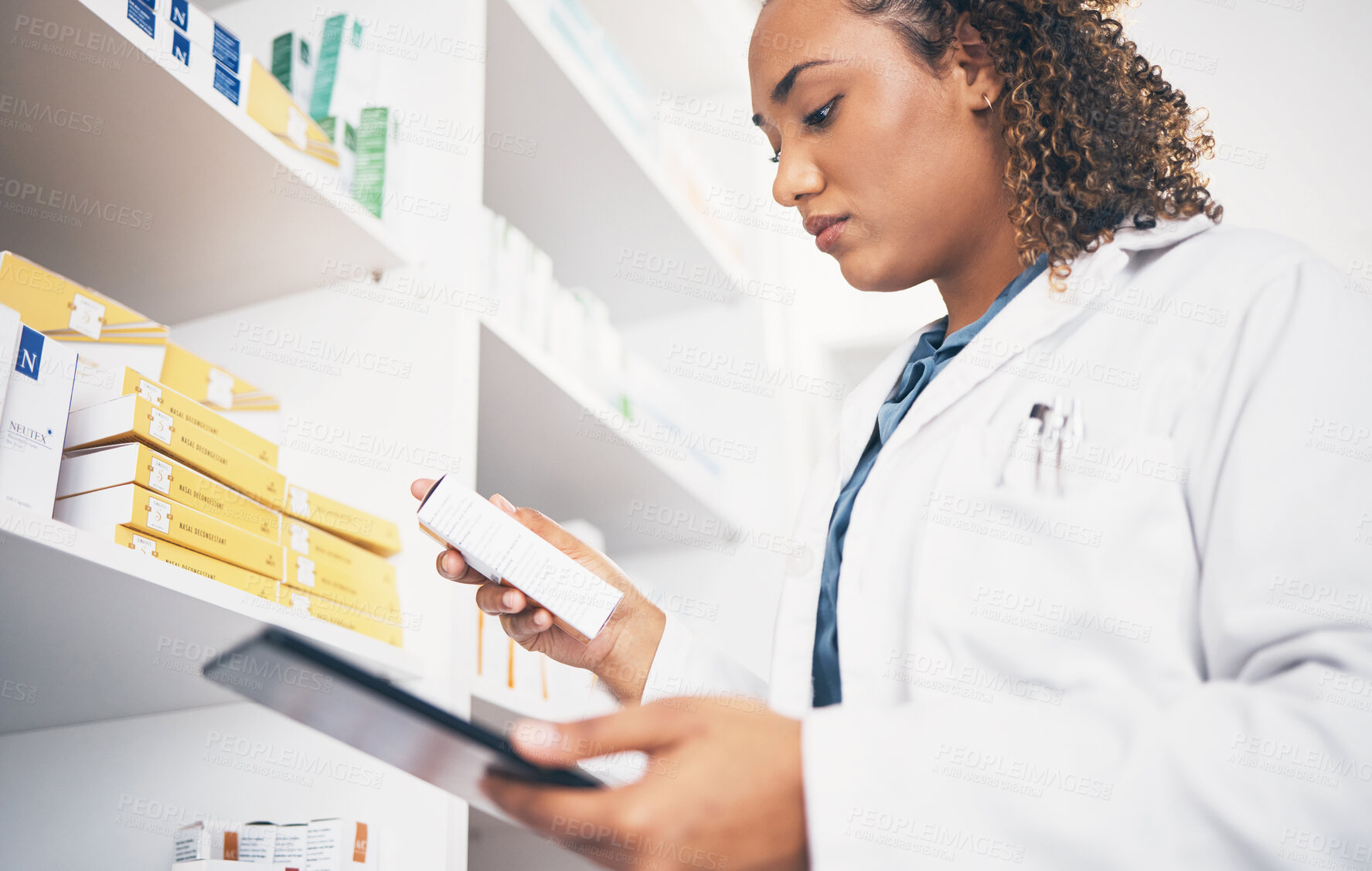 Buy stock photo Tablet, stock and medicine with a pharmacist woman at work to fill an online order or prescription. Medical, product and insurance with a female working as a professional in healthcare at a pharmacy