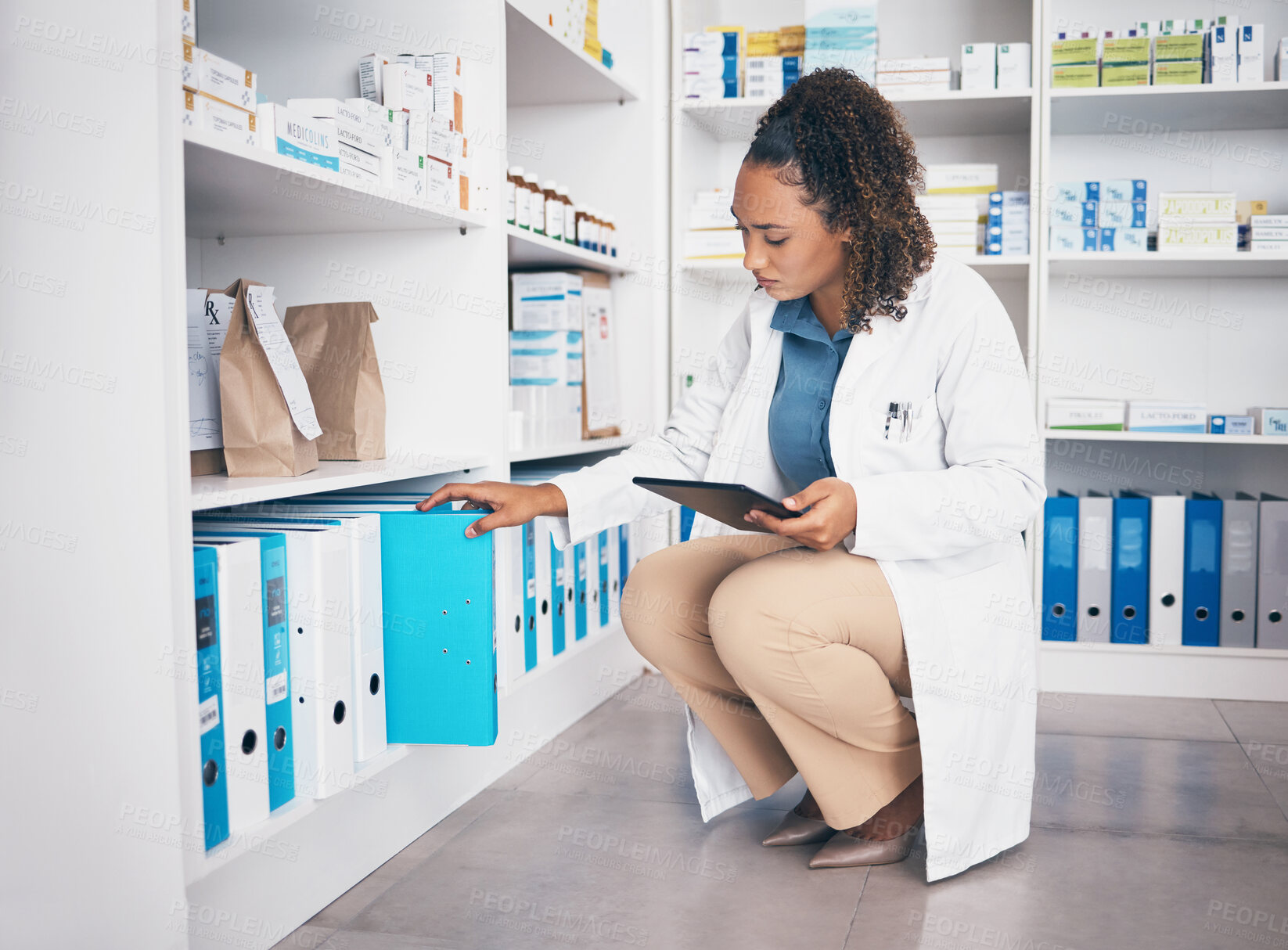 Buy stock photo Pharmacy shelf, file and pharmacist woman on tablet for medicine management, stock administration or inventory. E commerce, logistics and research of medical doctor or pharmacist with folder check