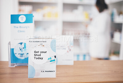 Covid vaccine, sign and pharmacy poster in a medical shop and clinic with mockup. Wellness, doctor and booster shot advertising placard showing health message for customer on a billboard with mock up