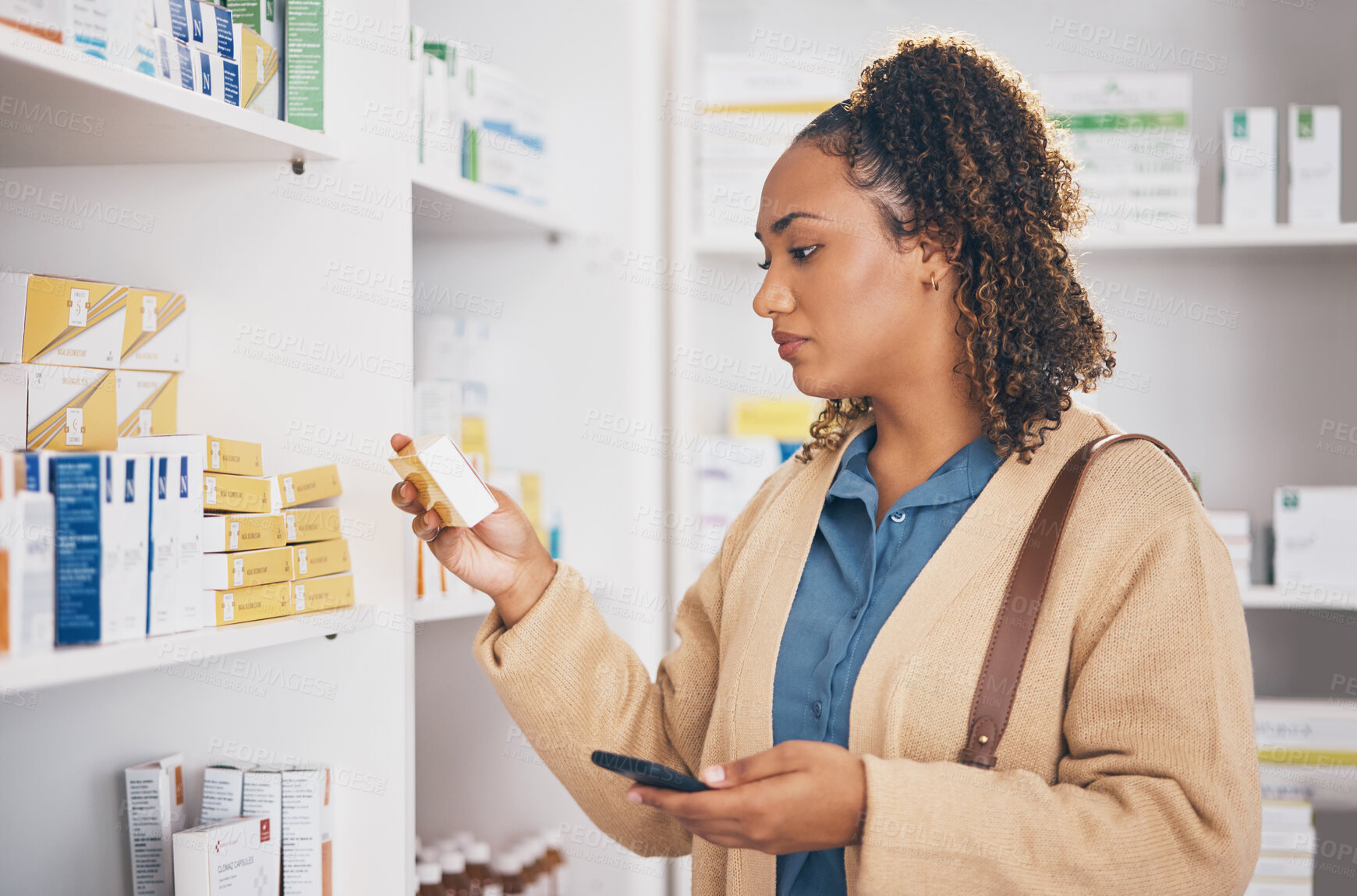 Buy stock photo Pharmaceutical, medication and female customer choosing healthcare products or drugs in a drugstore. Dispensary, medical and woman reading box of pills or medicine in retail pharmacy shop or chemist.