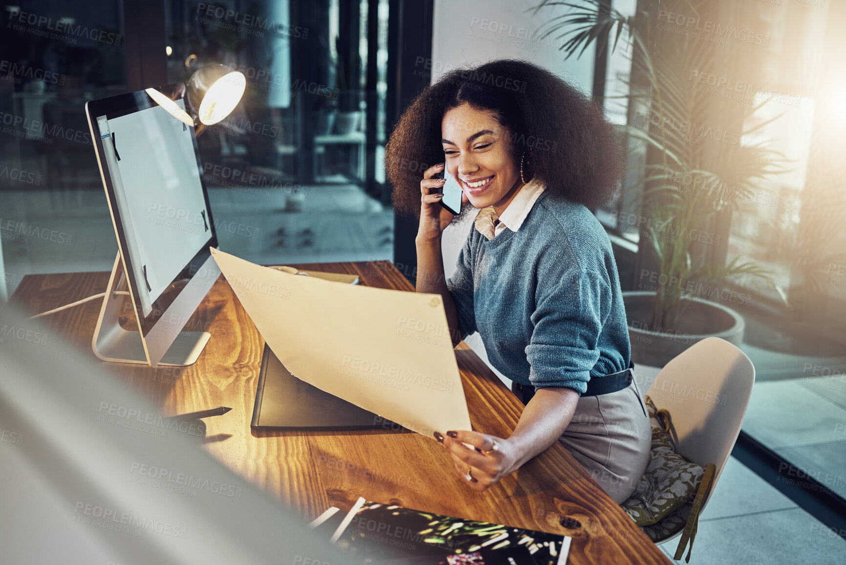 Buy stock photo Business woman, phone call and document in conversation, design or idea at the office. Female designer working late, talking on smartphone at night for communication, networking or project discussion