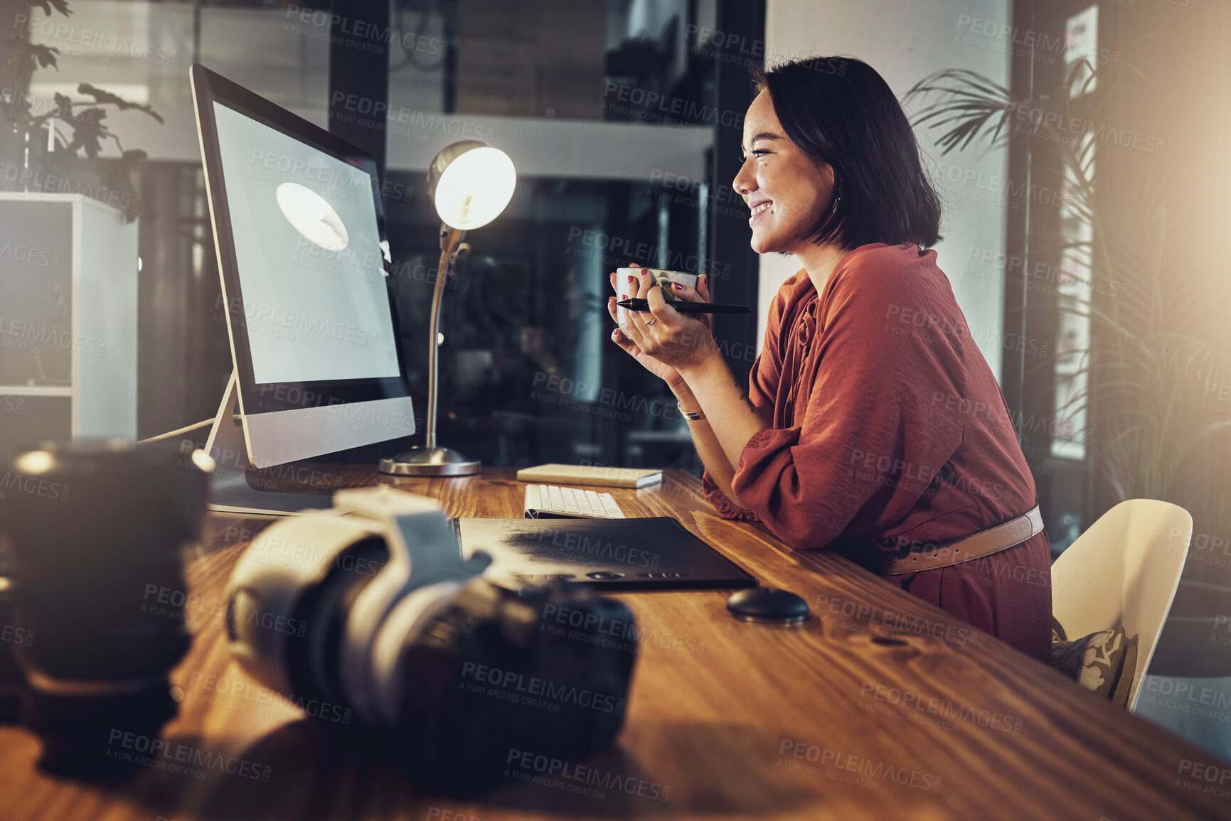 Buy stock photo Coffee, computer screen and woman in office with happy online research, digital marketing and business planning. Professional asian person with inspiration, creative ideas and tea at night on desktop