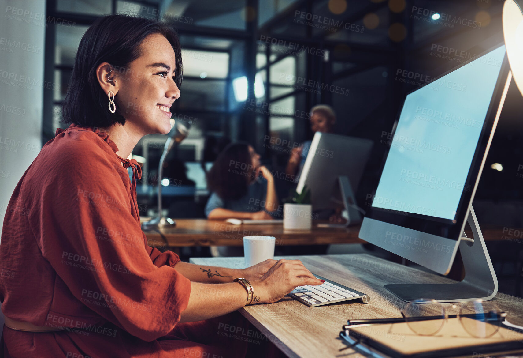 Buy stock photo Night, business and woman typing, smile and digital planning for company growth, proposal and website launch. Female employee, consultant and worker with computer, screen or working late for deadline