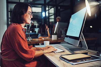 Buy stock photo Night, business and woman typing, smile and focus on data analysis, email and project deadline. Female employee, creative and worker with a computer, screen and working late for digital planning