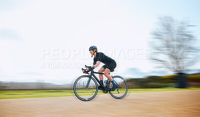 Buy stock photo Cycling, motion blur and fitness with woman in nature and mockup for speed, workout and challenge. Exercise, fast and travel with female cyclist riding on bike for journey, adventure and cardio