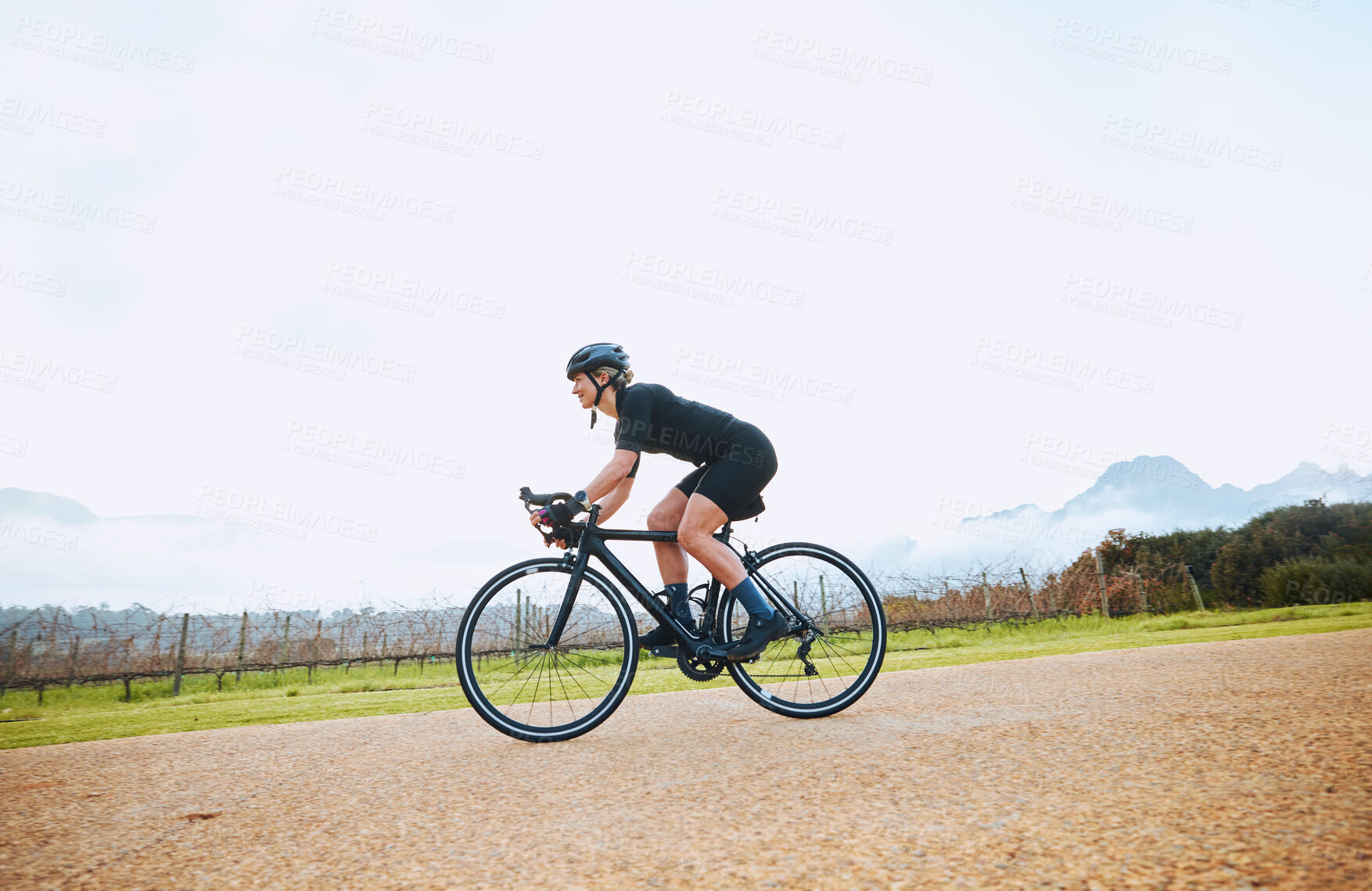 Buy stock photo Cycling, training and fitness with woman in nature and mockup for race, workout and challenge. Exercise, workout and travel with female cyclist riding on bike for journey, adventure and cardio