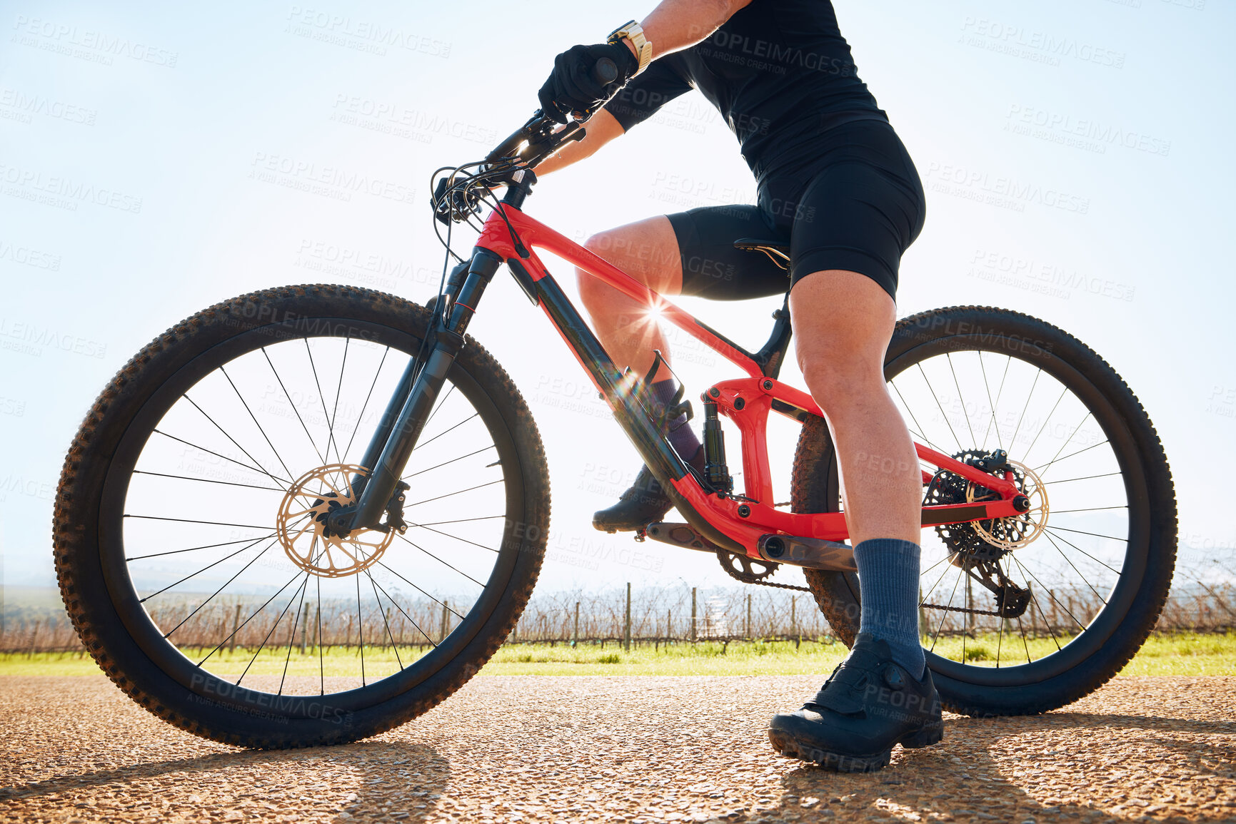 Buy stock photo Bicycle, ride outdoor and legs of person on a bike journey for sports race on a gravel road. Fitness, exercise and athlete doing sport training in nature on a countryside trail for cardio and workout