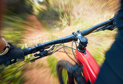 Buy stock photo Bike, cycling and motion blur with a sports person holding handle bars while riding outdoor closeup pov. Bicycle, fitness and speed with a cyclist or athlete mountain biking in nature during summer 