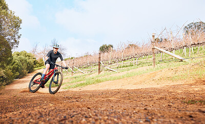 Buy stock photo Riding, nature and a man on a bike for cycling, fitness or practice for a race in the countryside. Adventure, sports and a cyclist on a bicycle for training, sports and outdoor cardio exercise