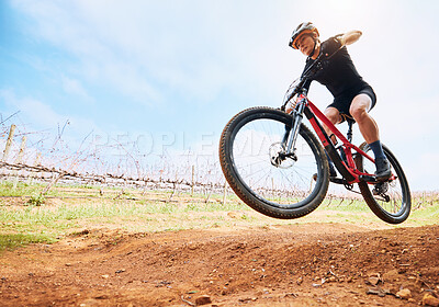 Buy stock photo Bicycle, countryside and woman on a bike with speed for sports race on a dirt road. Fitness, exercise and athlete doing sport training in nature on a park trail for mockup cardio and cycling workout