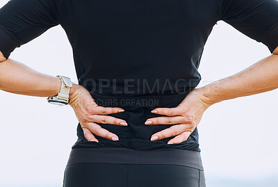 Buy stock photo Hands, woman and back pain during fitness, training or workout routine outdoors, discomfort and sore. Spine, issue and female with sports injury, problem and ache, fibromyalgia or accident