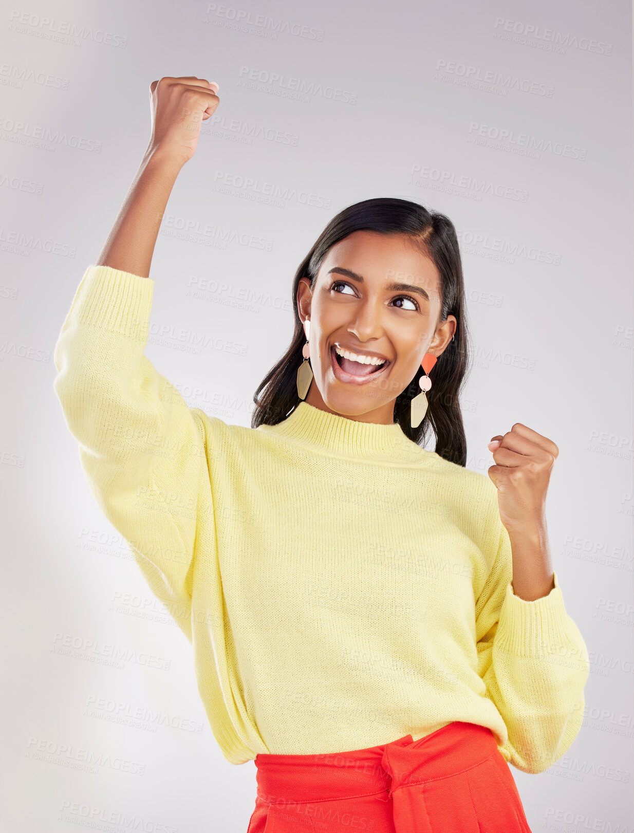 Buy stock photo Winner, happy and celebration with a woman on a white background in studio cheering for success or good news. Motivation, wow and excited with an attractive young female celebrating or winning