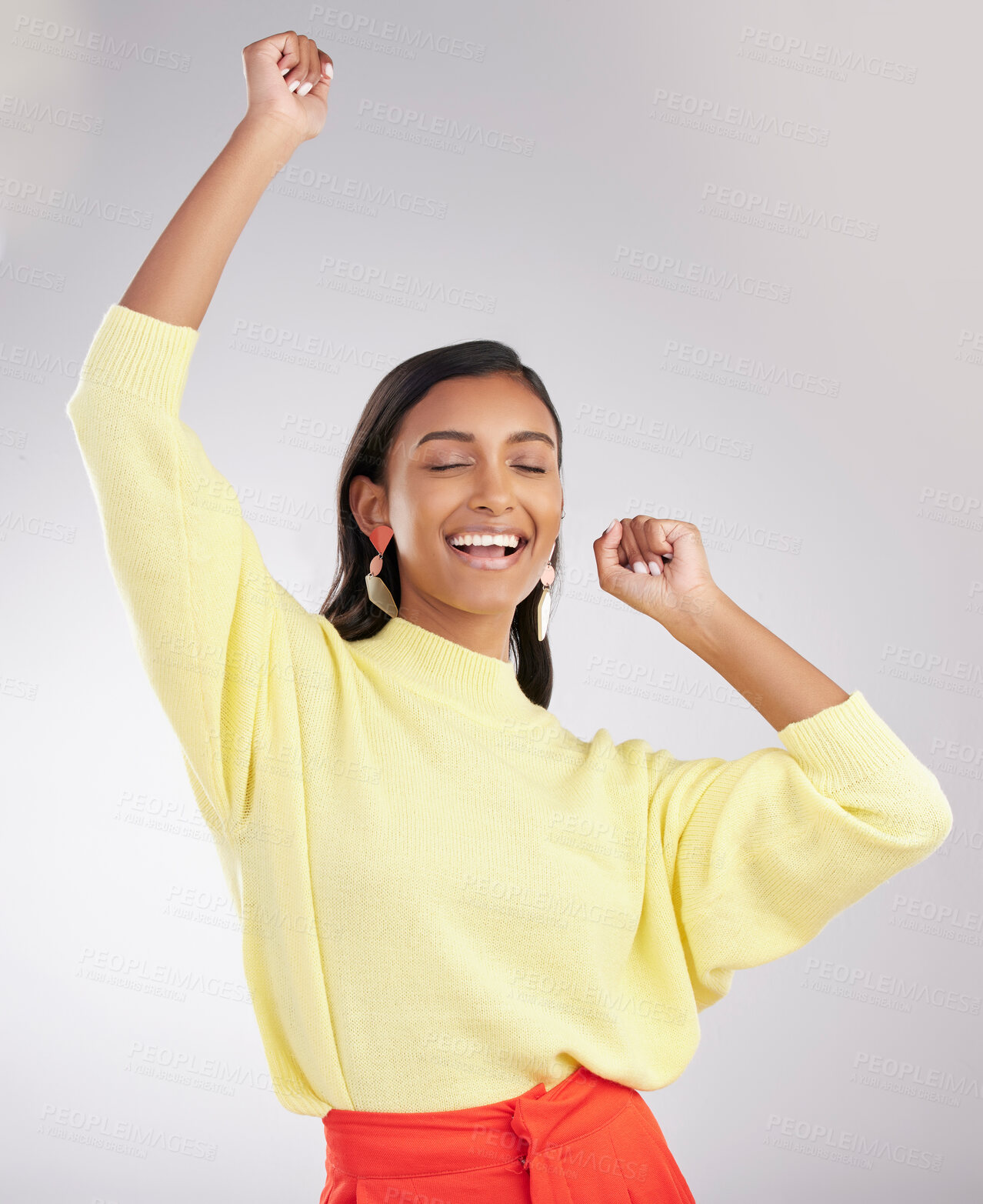 Buy stock photo Happy, excited and woman dance, celebration and cheerful against a grey studio background. Female dancer, model and person moving, groove and happiness with routine, motivation and stress relief