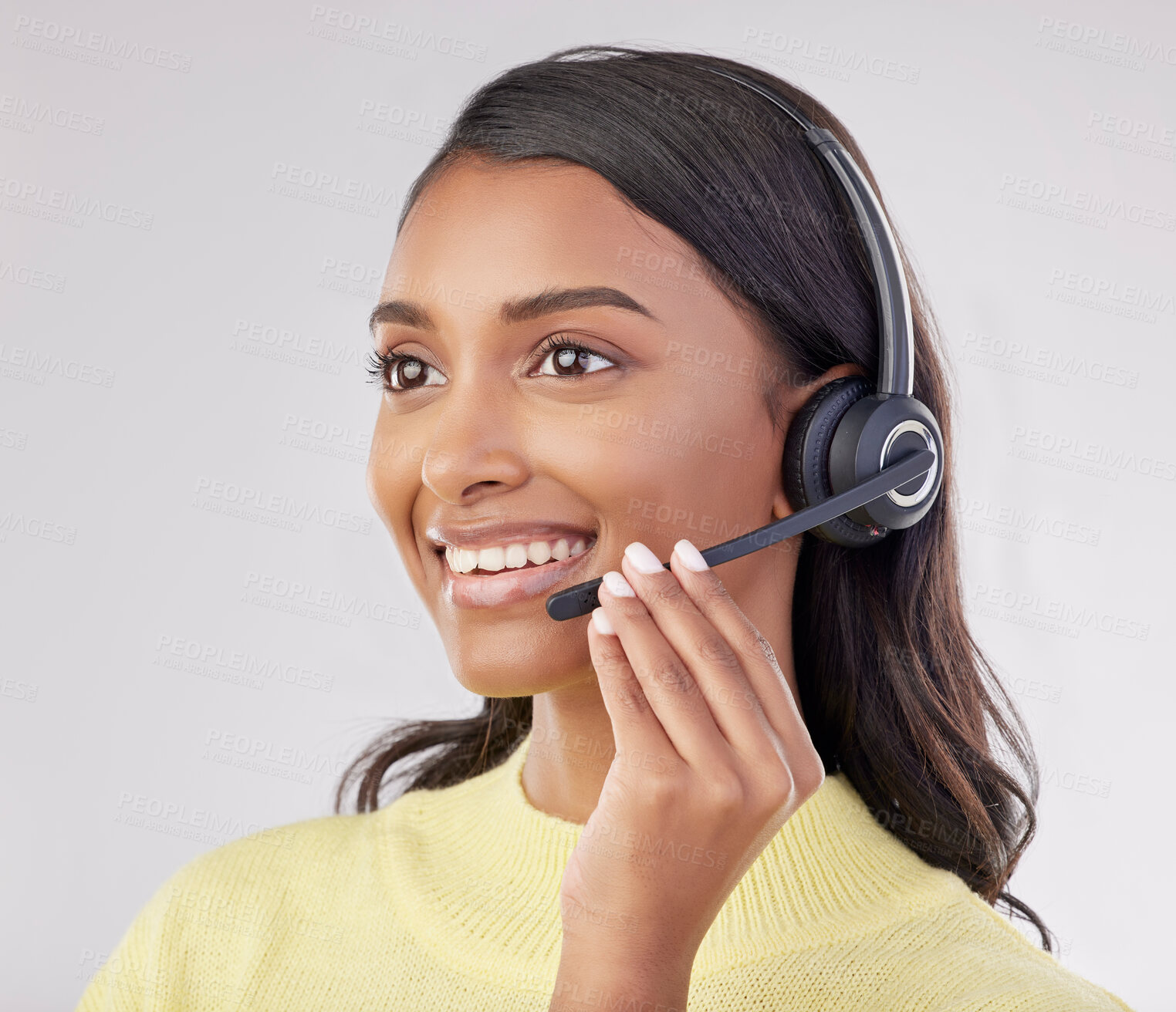 Buy stock photo Happy woman has smile on face, callcenter and headset with mic, CRM and contact us with consultant on studio background. Indian female, customer service agent and help desk with tech support worker